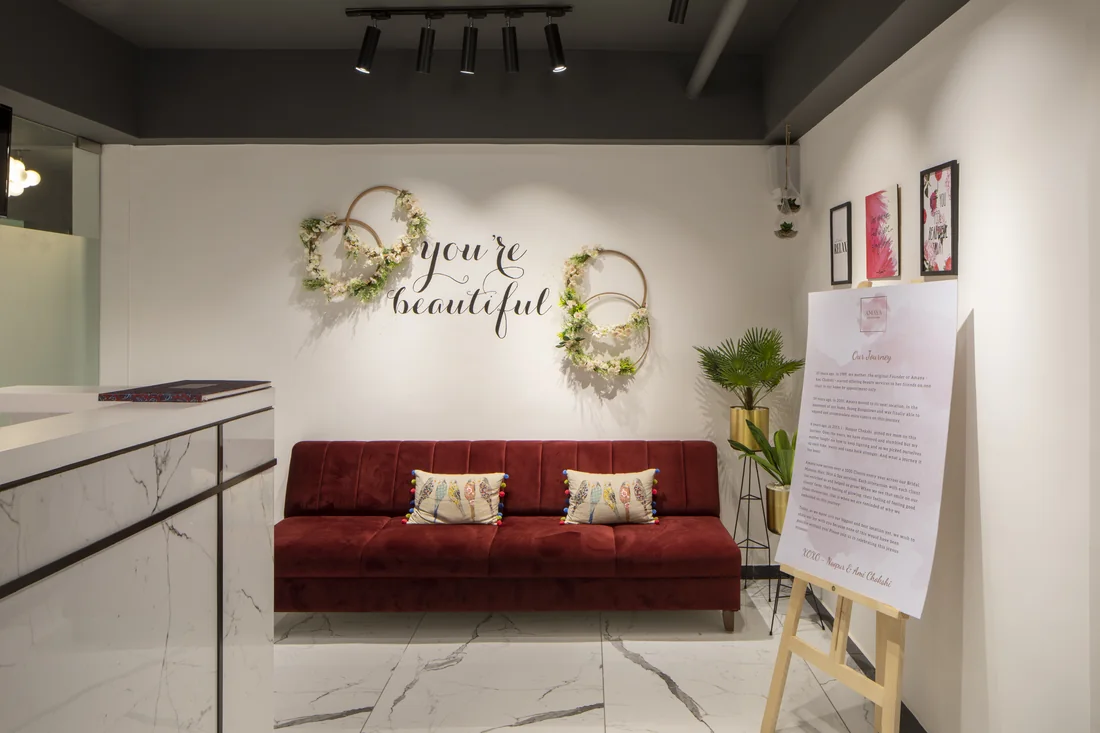 Amaya waiting lounge with floral wall decor